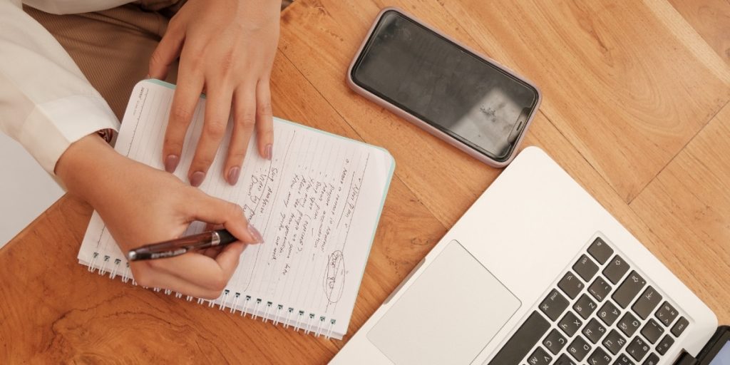 Healthcare professional brainstorming localized content ideas.